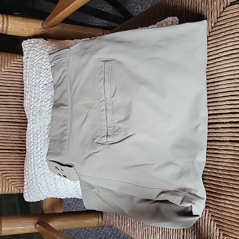 Under Armour shorts, size 40, tan